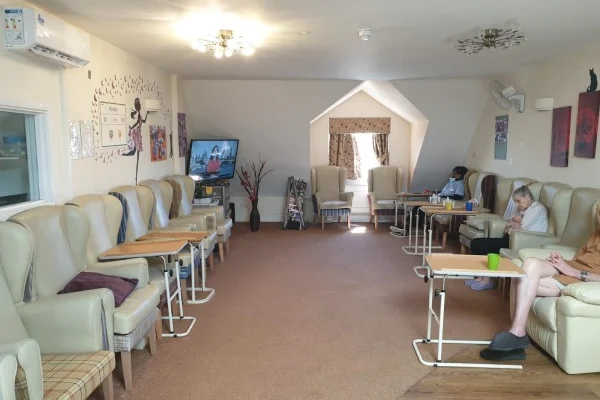 Residents relaxing in the lounge at Moreland House Care Home, Hornchurch